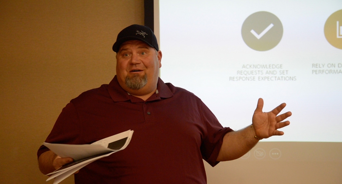 Utility West Project Manager Dustin Schmidt speaks during the Remote Workforce Management training session.
